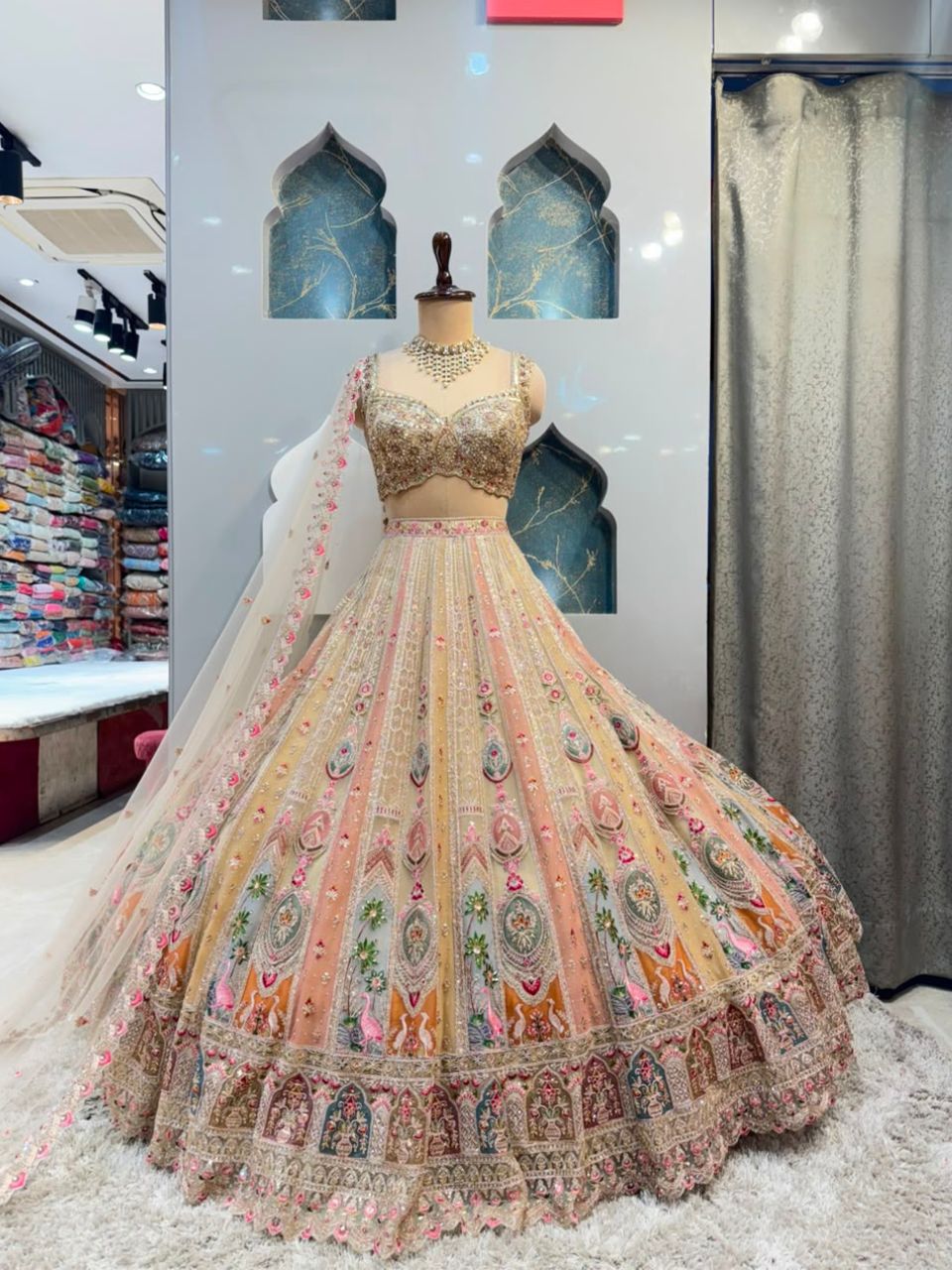 "BLUSH PEACH AND IVORY FLORAL EMBROIDERED LEHENGA"