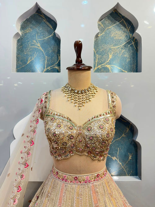"BLUSH PEACH AND IVORY FLORAL EMBROIDERED LEHENGA"
