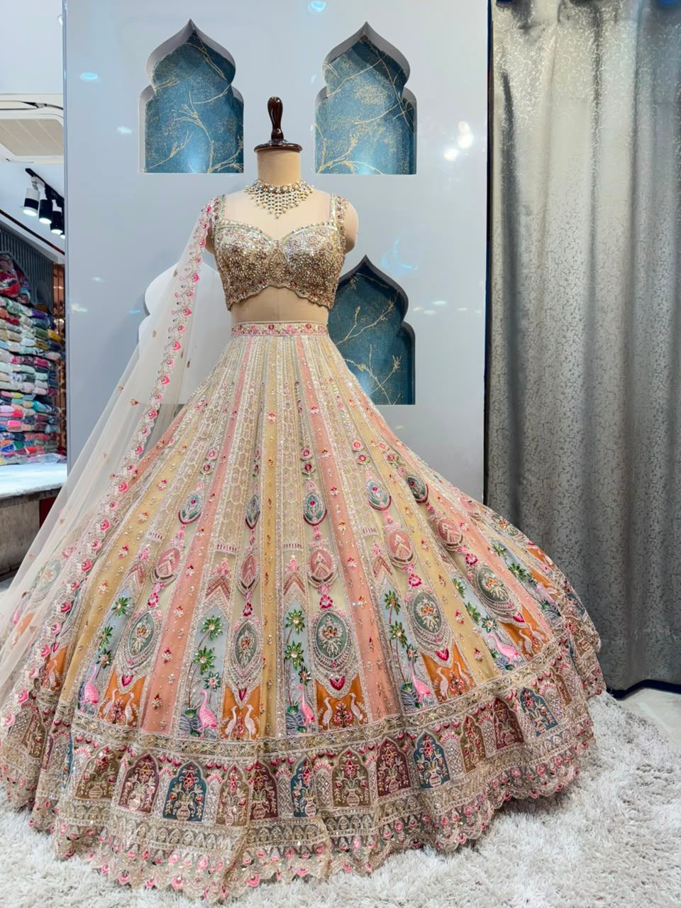 "BLUSH PEACH AND IVORY FLORAL EMBROIDERED LEHENGA"