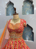 "ROYAL CORAL AND GOLD LEHENGA" image 2