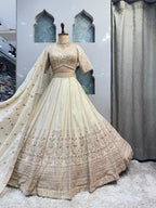 "ETHEREAL CREAM AND GOLD LEHENGA" image 4