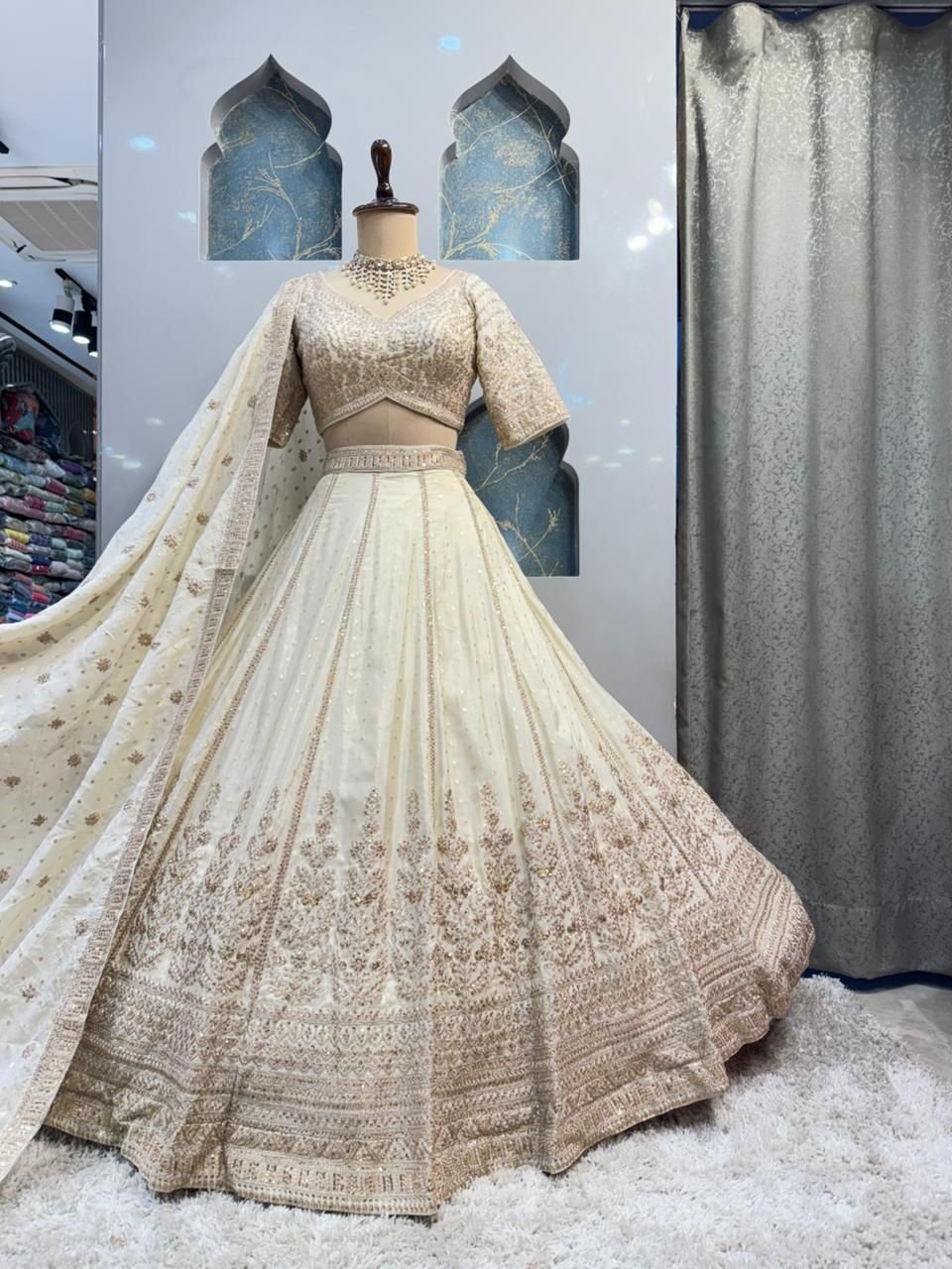 "ETHEREAL CREAM AND GOLD LEHENGA" image 4