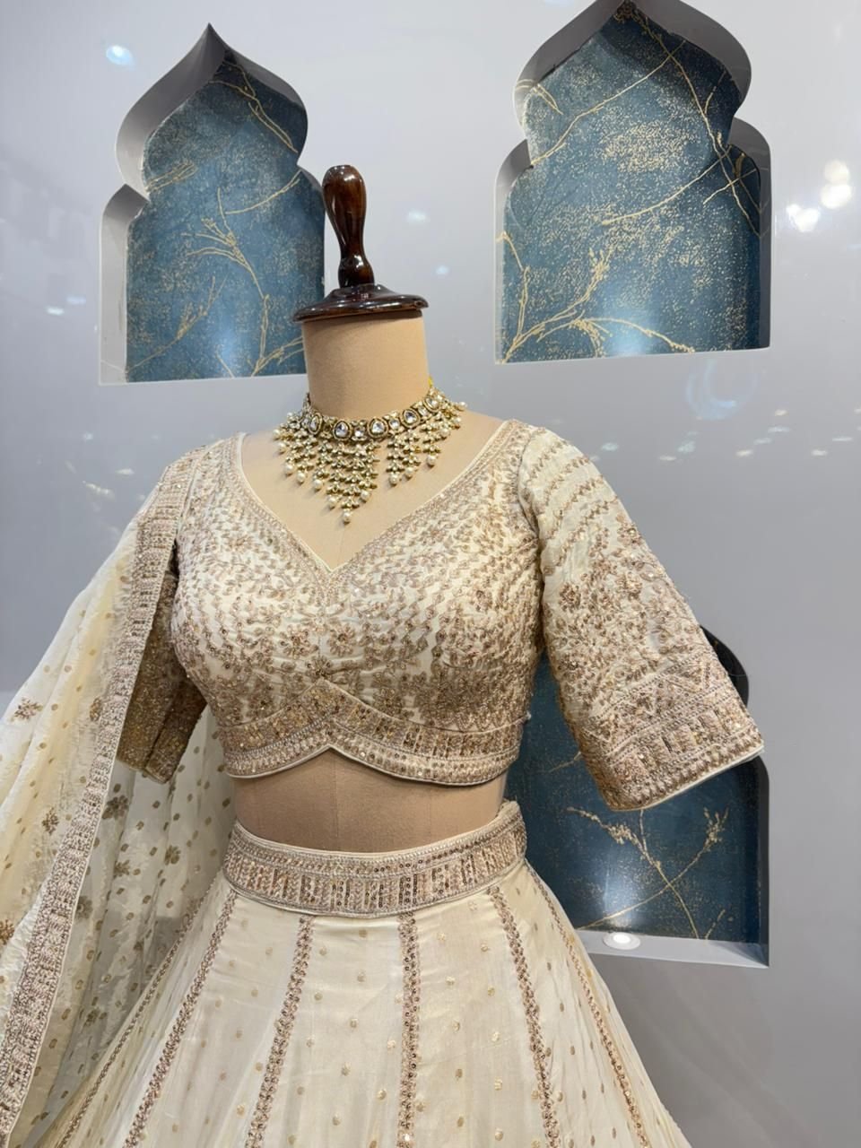 "ETHEREAL CREAM AND GOLD LEHENGA" image 2
