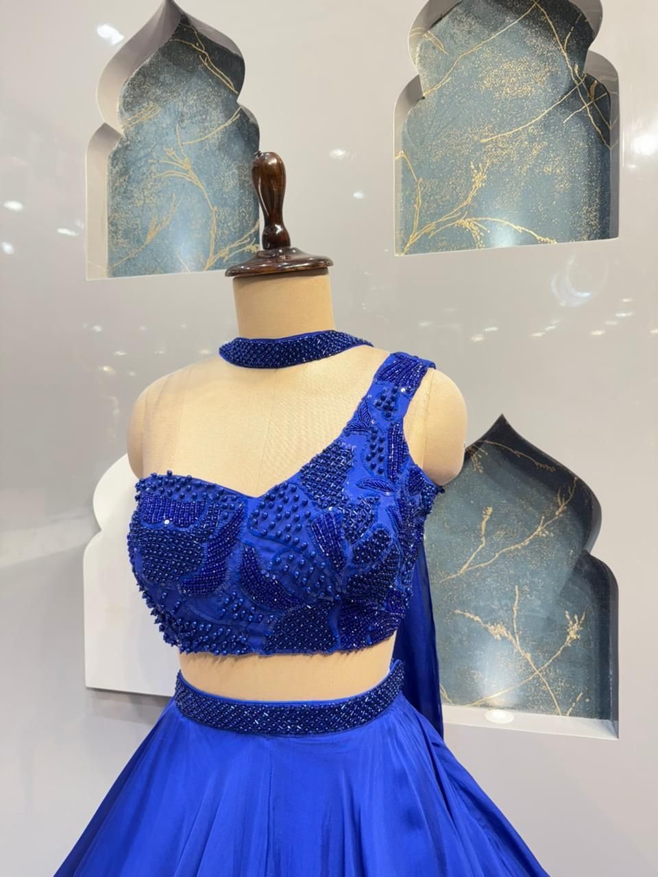"MIDNIGHT SAPPHIRE ONE- SHOULDER LEHENGA" image 2
