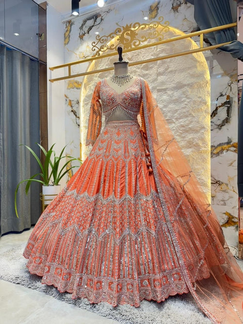 "PEACH ROYALE HEAVY EMBROIDERED LEHENGA" image 0