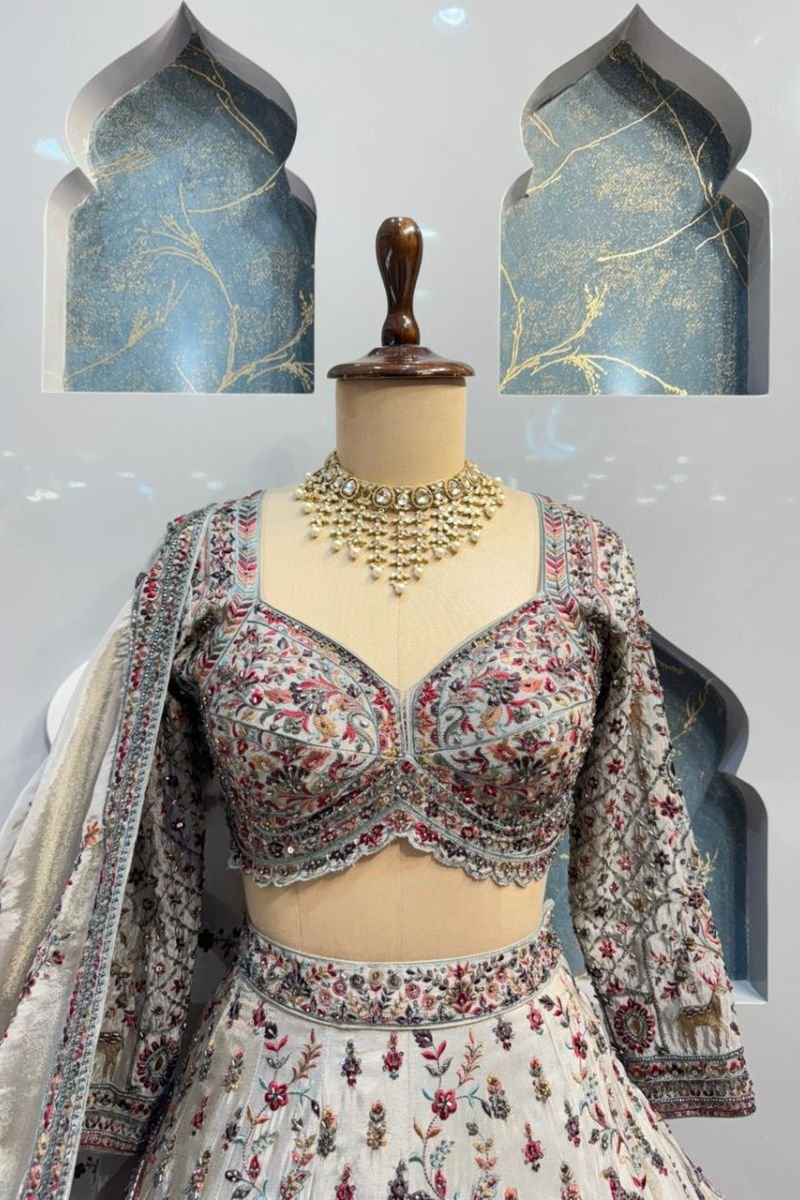 "HEIRLOOM IVORY LEHENGA" image 1