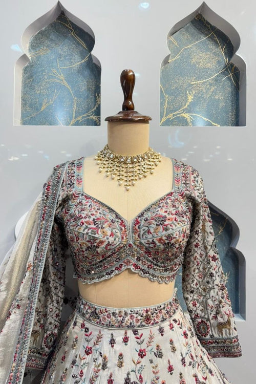 "HEIRLOOM IVORY LEHENGA" image 1