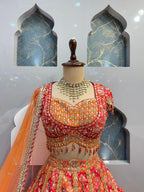 "ROYAL CORAL AND GOLD LEHENGA" image 1