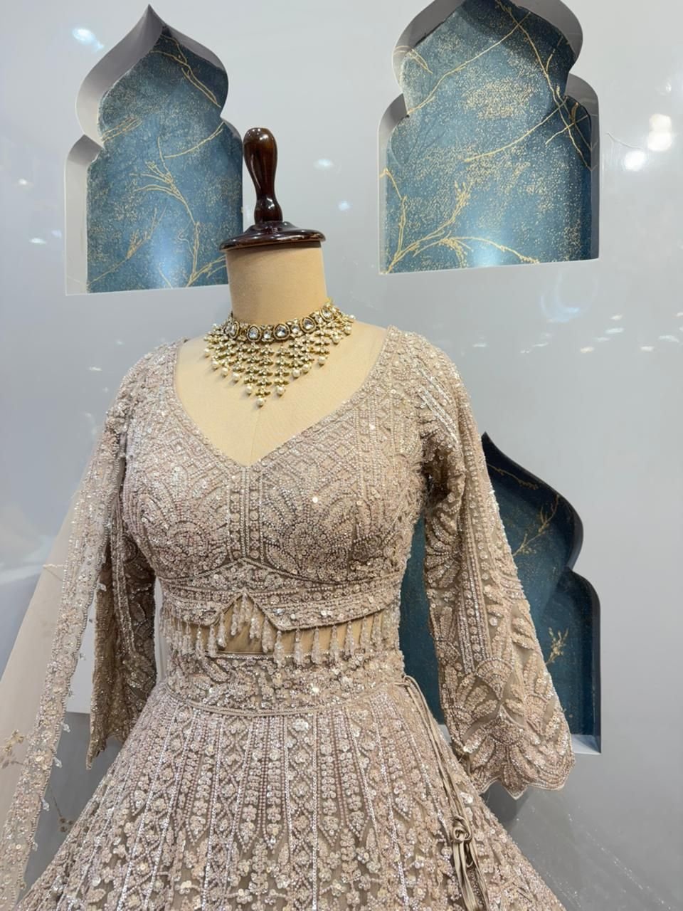 "CHAMPAGNE ROYALE HEAVILY EMBELLISHED LEHENGA" image 2