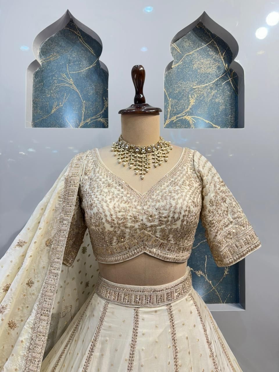 "ETHEREAL CREAM AND GOLD LEHENGA" image 1