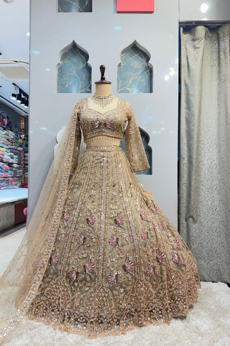 "GOLDEN BLUSH PEACOCK ROYALE LEHENGA"